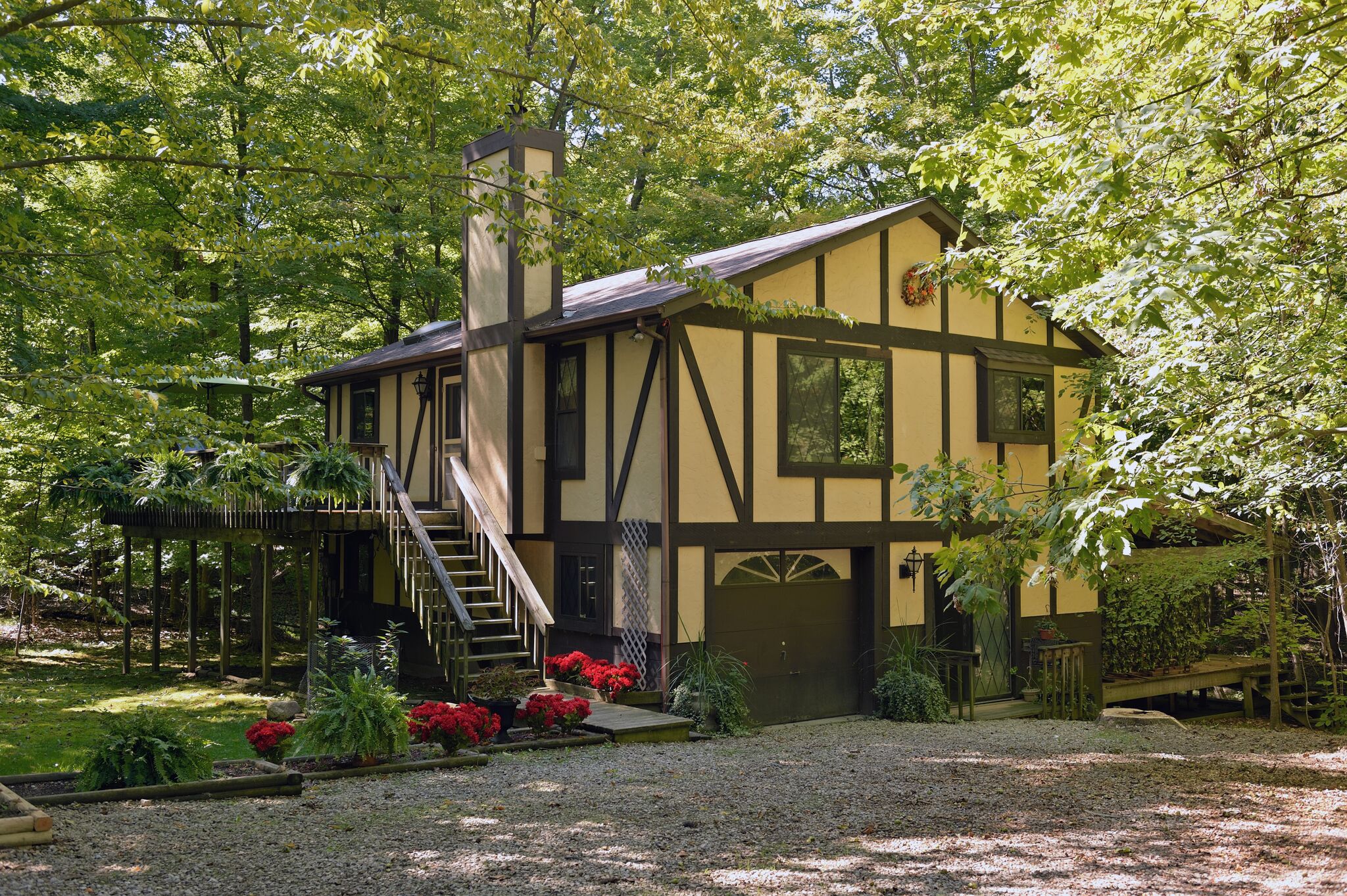 guest cottage from side with shaded trees 
