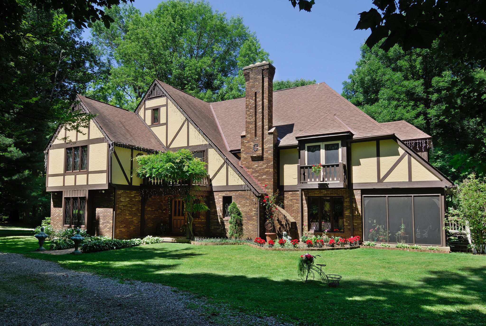 english tudor manor on sunny day